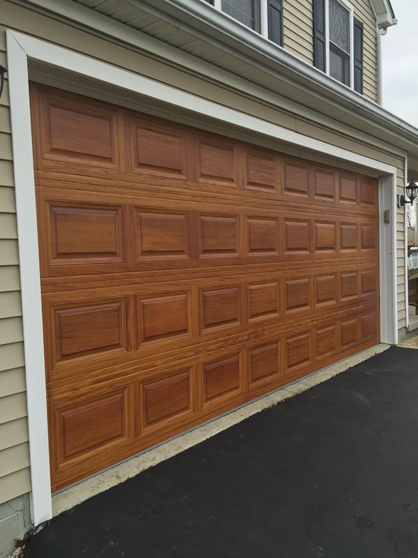 Garage doors with raised cedar panel in San Jose, CA